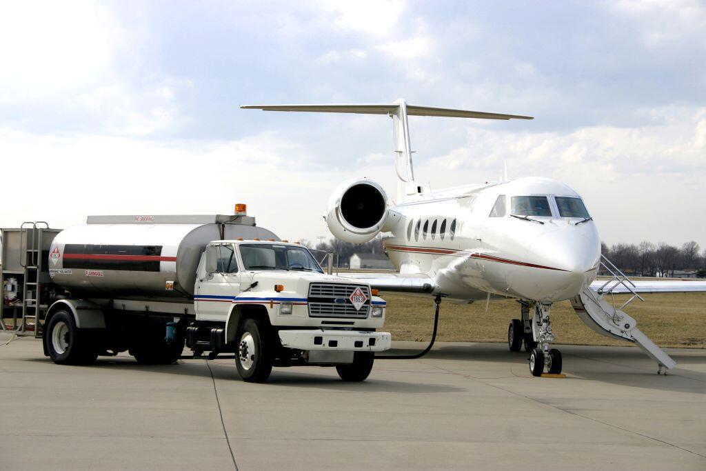 A business jet getting fuel 