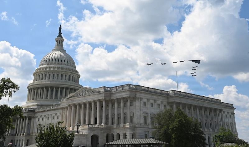 u.s. capitol with military jets flying overhead