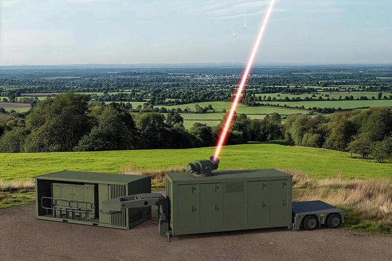 mobile command unit on rural field shooting laser beam skyward
