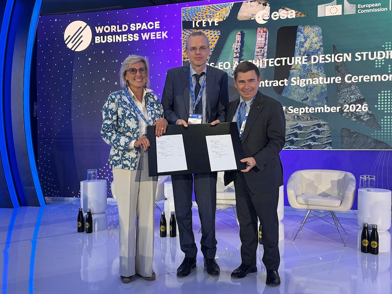 officials on stage at world space business week