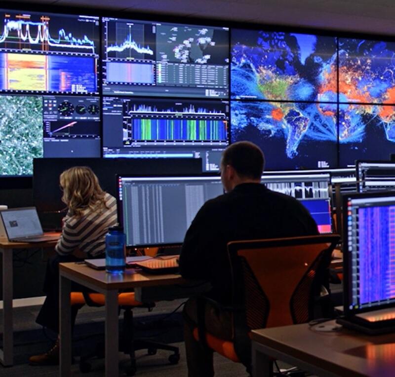 analysts work at computer stations