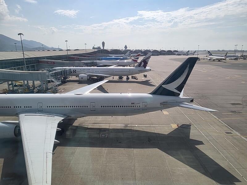 cathay pacific aircraft parked on tarmac