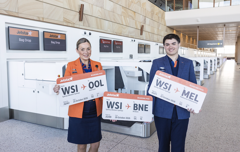 jetstar airport staff with oversized boarding passes from wsi to ool, bne, mel
