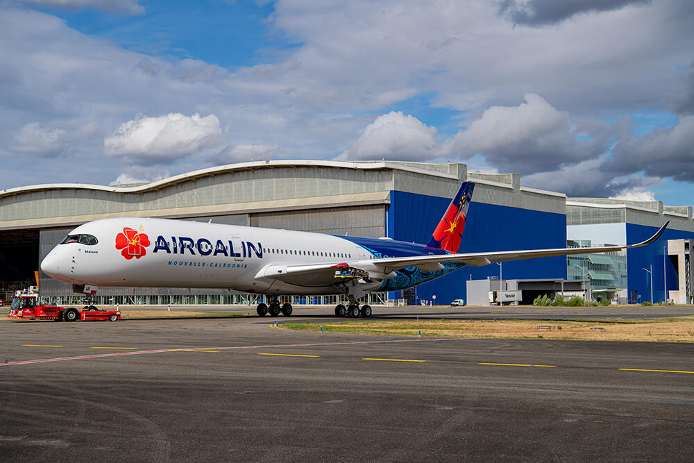Aircalin aircraft in front of hangar