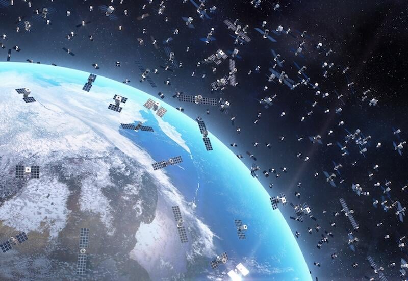 hundreds of satellites orbiting over earth