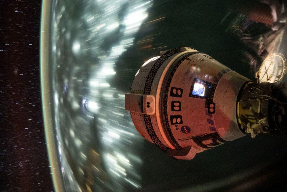 NASA Caption: Starliner reached the space station for a crewed flight test on June 6, 2024,  but safety issues prompted NASA to return the capsule uncrewed