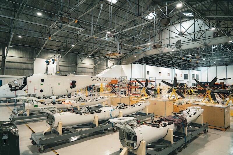 large G-EVTA aircraft sits in an industrial hangar