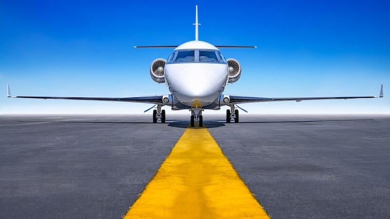 business jet on runway