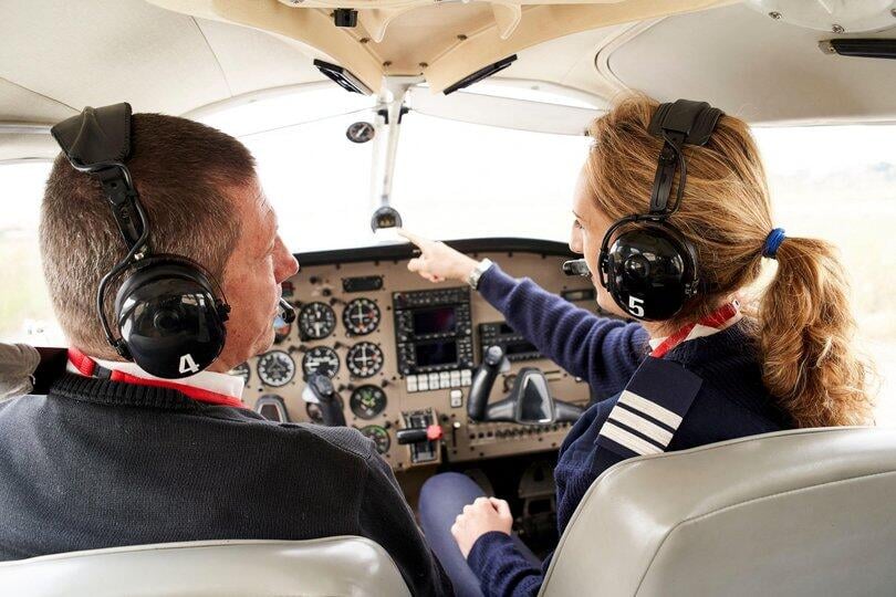 pilot trainee and flight instructor in cockpit