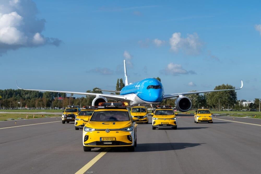 KLM Airbus A350-900 at Schiphol Airport with police escort