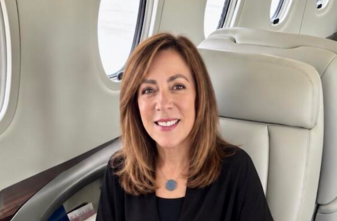 Stephanie Abrams is seated aboard a NetJets Cessna Citation en route to treatment at Memorial Sloan Kettering Cancer Center.  Credit: Stephanie Abrams
