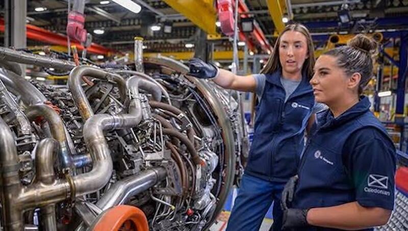 ge caledonian engineers examining engine