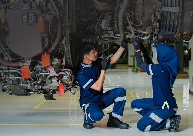 gmf aeroasia engineers carrying out MRO work