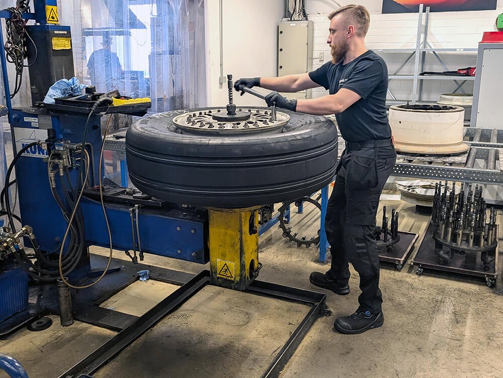 Technician working on wheel