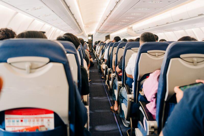 passengers seated on an aircraft