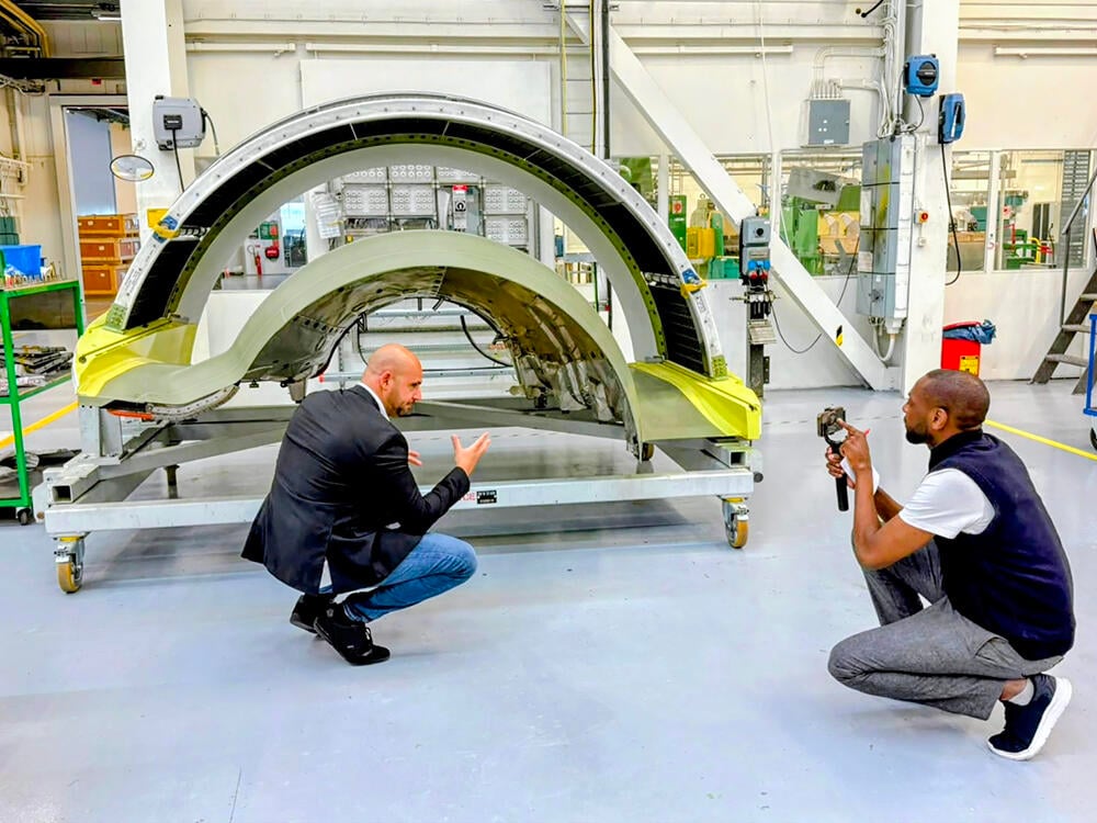 Chamoun and Mwanalushi in front of nacelle structures