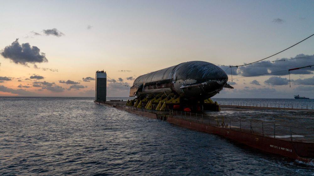SpaceX Caption: The Starship spacecraft that flew on July 24 was loaded onto a semi-submersible ship on Aug. 25 near Christmas Island. It reached Starbase, Texas, on Oct. 7. 