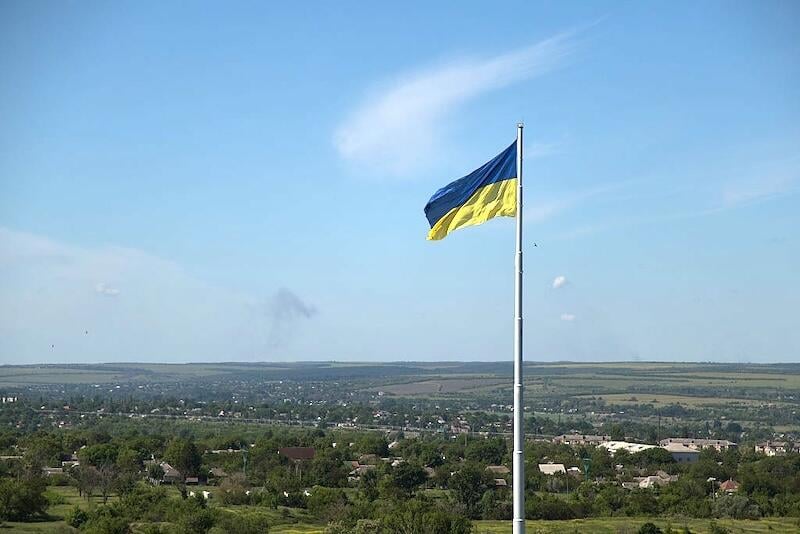 ukrainian flag waves in wind in kramatorsk, ukraine