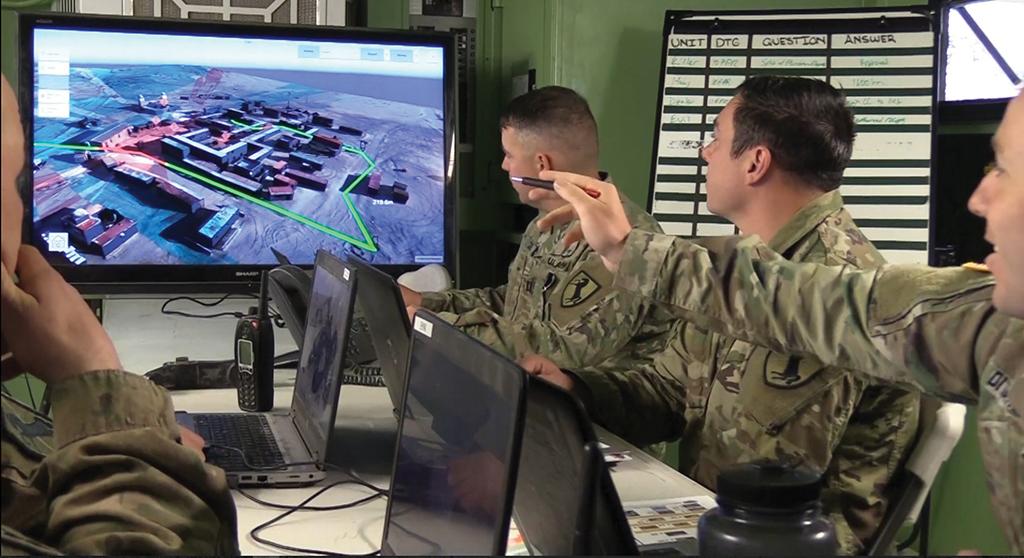 soldiers study new digital terrain maps