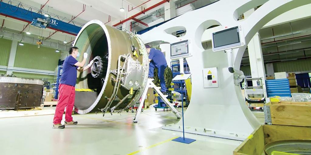 technician working on aircraft engine