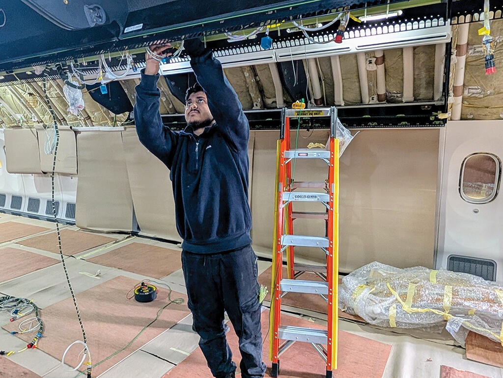 mechanic working on aircraft