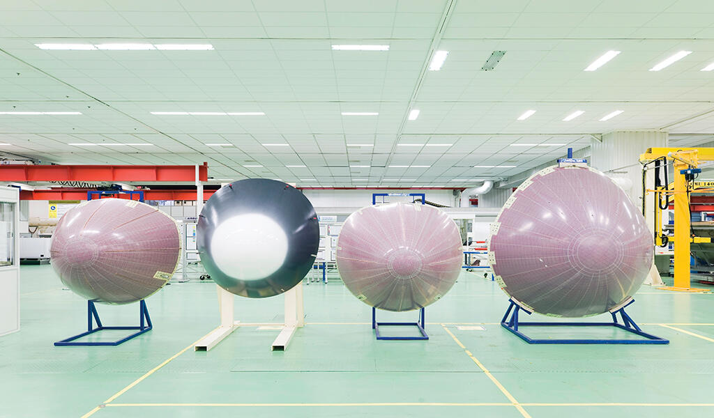 four radomes on display