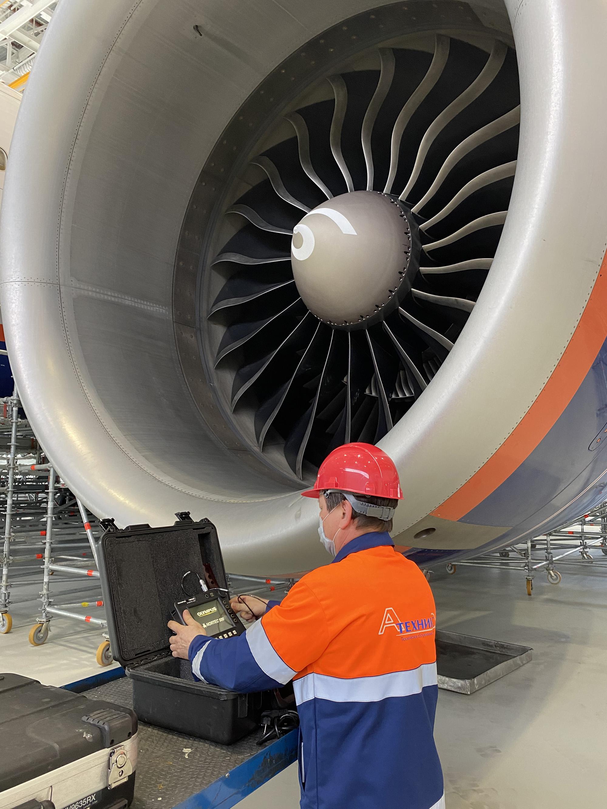 A-Technics technician performs non-destructive inspection on Aeroflot Boeing 777.