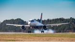Delta A220 taking off