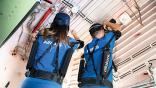 Airbus technicians working with exoskeletons
