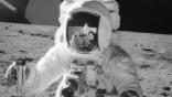 Astronaut Alan Bean with lunar soil sample