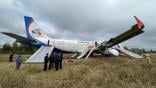 Ural airlines landing in wheat field