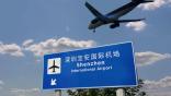 shenzhen airport sign with airplane