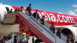 airasia passengers deplaning in china