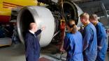 Aviation maintenance instructor with students