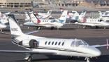 A busy business aircraft ramp promo image