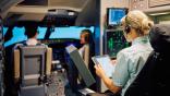 student pilots in flight simulator