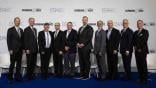 business aviation oem leaders posed for photograph in front of EBACE 2024 screen