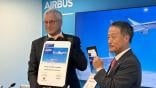 Airbus Commercial Aircraft CEO Christian Scherer and JAL procurement SVP Yukio Nakagawa.