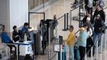 passengers in TSA screening line