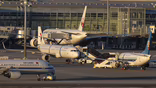 chinese and japanese airlines' jets on tarmac