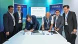 Thales and Indigo executives sign agreements.