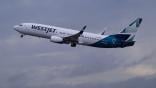 westjet jet taking off
