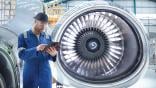 person standing in front of aircraft engine