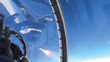 cockpit view of F-15EX firing AIM-120D missile