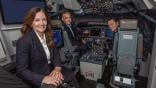 three people in Boeing 737 MAX cockpit simulator