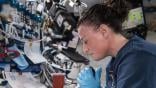 NASA astronaut Serena Auñón-Chancellor mixes protein crystal samples onboard the ISS. 