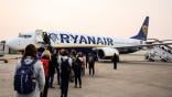 passengers boarding ryanair jet