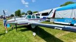 The AOPA has tested unleaded avgas on a Beechcraft Baron demonstration aircraft, shown on display at EAA AirVenture Oshkosh in 2024. 
