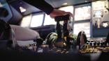 pilot's hand on flight deck controls