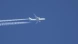 klm aircraft in flight creating contrails